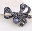Elegant Black Flower Brooch with Rhinestone & Pearl Accents