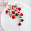 Elegant Gold-Tone Red & Black Rhinestone Floral Statement Brooch