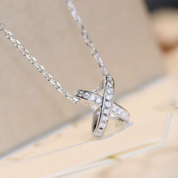 Sparkling X-Shape Pendant Necklace – Elegant Crystal Cross-Over