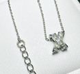 Sparkling X-Shape Pendant Necklace – Elegant Crystal Cross-Over