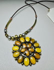 Ornate Circular Pendant Necklace – Yellow & Gold-Tone Boho Style