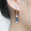 Oceanic Blue Crystal Oval Drop Earrings – Silver Tone