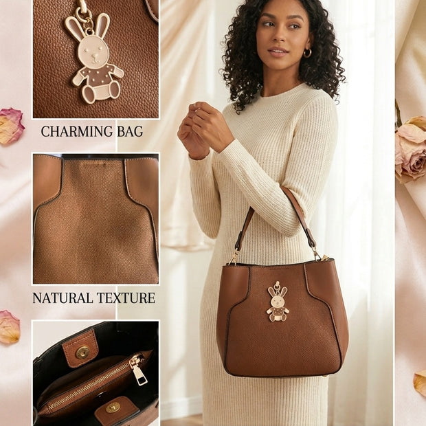 Woman holding a brown handbag with a decorative charm, surrounded by close-up details on a light pink background.