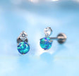 F136 Titanium Blue Opal Flat Back Stud Earrings – 18G Hypoallergenic Piercing