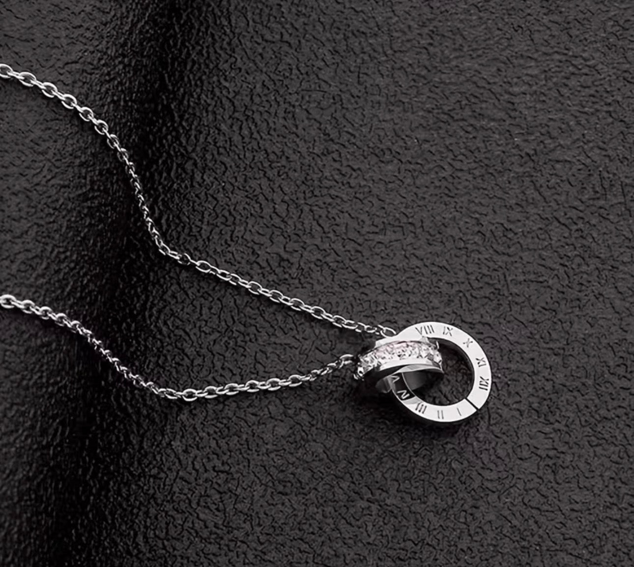 Elegant Stainless Steel Interlocking Ring Crystal Pendant Necklace