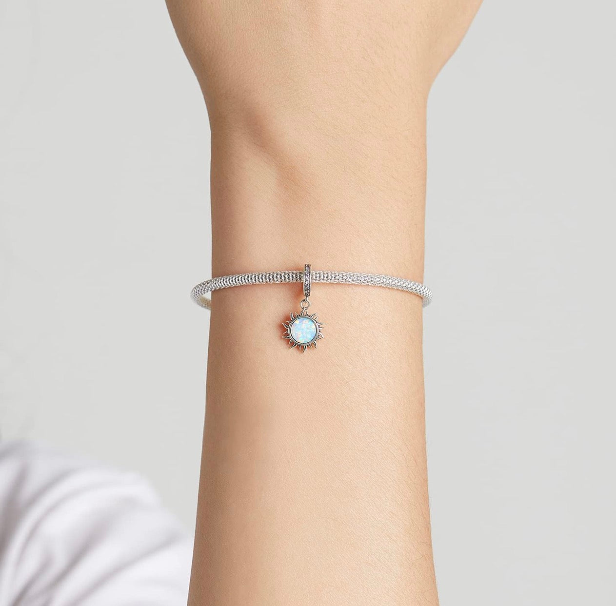 Opal Sun Charm