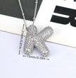 Sparkling Cubic Zirconia Bubble Letter Necklace in Silver Plating