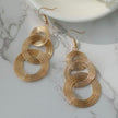Retro Spiral Multi-Circle Statement Earrings – Gold Tone