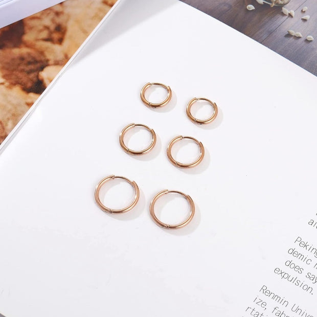 Minimalist 14K Gold Hoop Earrings – 9mm Petite Huggies